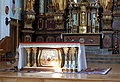 * Nomination Altar in the church in Wola Gułowska, Poland. --Sfu 07:11, 10 September 2008 (UTC) * Decline Lens flare from reflection. TimVickers 22:54, 11 September 2008 (UTC)