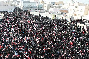 Women taking part in a pro-democracy sit in in Sitra.jpg