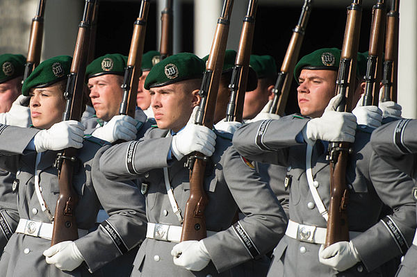 Wachbataillon members shoulder arms in formation at the Defense Ministry in Berlin.