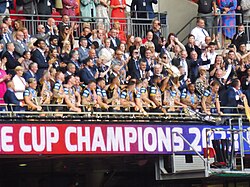 Leigh Leopards players lifting the Challenge Cup on Wembley's Royal Balcony.