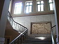 Rilievo sulle scale / A relief along the staircase.