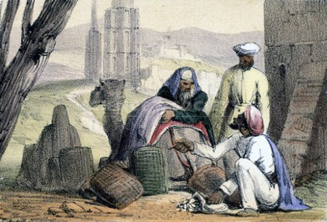Cowry shells being used as money by an Arab trader