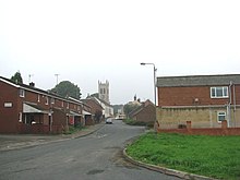 The church seen in the surrounding residential area Aire Street, Knottingley, looking west towards St Botolph's Church - geograph.org.uk - 246690.jpg