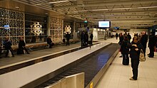 Arrival area with baggage conveyor