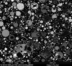 Photomicrograph made with a scanning electron microscope and back-scatter detector: cross section of fly ash particles Back-Scattered Electron Micrograph of Coal Fly Ash small.tif
