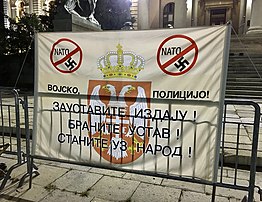 Banner placed during the anti-NATO protest in front of the National assembly in Belgrade