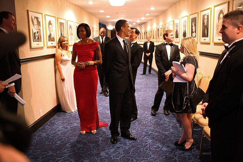 File:Barack and Michelle Obama wait in a hallway at the Washington Hilton Hotel, 2019.jpg