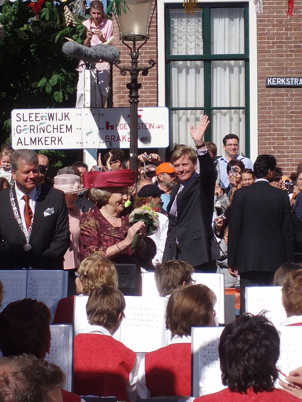 Queen Beatrix and her son and heir Willem-Alexander, Prince of Orange (waving) visit Woudrichem in 2007