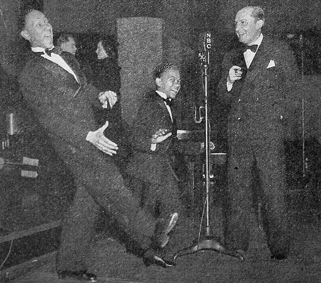 Ben Bernie with the Nicholas Brothers, photographed during a Radio City broadcast (Radio Mirror magazine, April 1936)