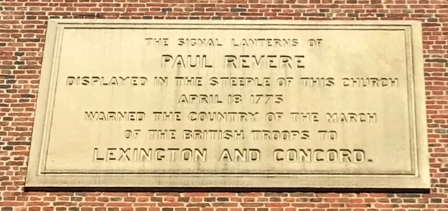 A plaque on the side of Old North Church describing actions of Paul Revere in 1775