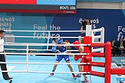 Deutsch: Boxen bei den Olympischen Jugendspielen 2018 Tag 12, 18. Oktober 2018 - Kampf um die Bronzemedaille im Fliegengewicht Mädchen – Heaven Destiny Garcia (USA, blau) schlägt Goryanana Stoeva (Bulgarien, rot) 5-0; Ringrichter ist Ishanguly Meretnyyazov (Turkmenistan). English: Boxing at the 2018 Summer Youth Olympics on 18 October 2018 – Girl's flyweight Bronze Medal Bout - Heaven Destiny Garcia (USA, blue) beats Goryanana Stoeva (Bulgaria, red) 5-0; Referee is Ishanguly Meretnyyazov (Turkmenistan). Español: Boxeo en los Juegos Olímpicos Juveniles de Verano de 2018 en 18 de octubre de 2018 - Combate a medalla de bronce de peso mosca para mujeres: Heaven Destiny Garcia (Estados Unidos, azul) le gana a Goryanana Stoeva (Bulgaria, roja) 5-0; El árbitro es Ishanguly Meretnyyazov (Turkmenistán).