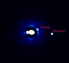 Adaptive Optics observations of (87) Sylvia, showing its two satellites, Remus and Romulus. CMSylvia.png