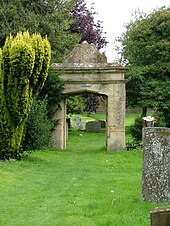 Old gateway in Churchill graveyard Churchyard 17th-century gateway at All Saints' Church, Churchill, Oxfordshire.jpg