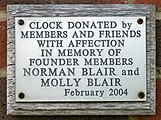 Inscription: Clock donated by members and friends with affection in memory of founder members Norman Blair and Molly Blair, February 2004.