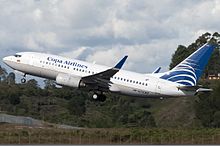 A former Boeing 737-700 of Copa Airlines Colombia taking off at José María Córdova International Airport in 2011