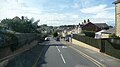 English: Victoria Road, Cowes, Isle of Wight, seen from a bus on Southern Vectis route 1. Double-deckers were in service on route 1, as it was Cowes Week, and the Pontoon was not being served by buses after 10am each day. The bus was turning into the road at the time, making a right turn from Mill Hill Road.