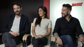 Cox with Daredevil castmates Elodie Yung and Jon Bernthal in 2016