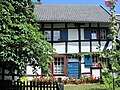 Two-storey half-timbered house