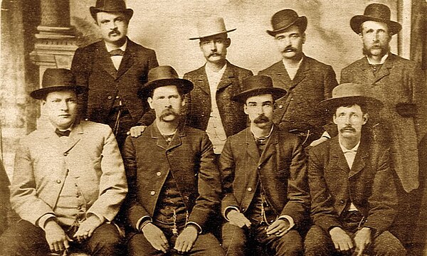 The "Dodge City Peace Commission" on June 10, 1883. From left to right, standing: William H. Harris, Luke Short, Bat Masterson, William F. Petillon; s