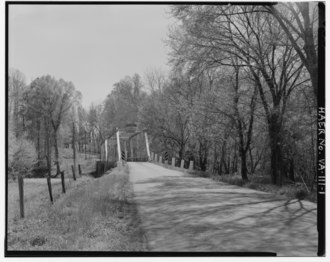 Gholson Bridge, spanning Meherrin River on VA State Route 715 at Lawrenceville, Brunswick County, Virginia GENERAL VIEW IN CONTEXT, LOOKING SOUTH - Gholson Bridge, Spanning Meherrin River at VA State Route 715, Lawrenceville, Brunswick County, VA HAER VA,13-LAWV.V,1-1.tif