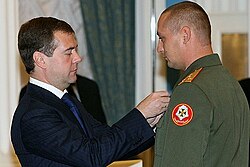 En el Kremlin en la ceremonia de premiación con el presidente ruso Dmitry Medvedev (izquierda)