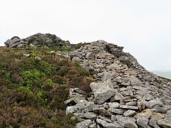Inside the Celtic Iron Age hillfort of Tre'r Ceiri, Gwynedd Wales, with its 150 houses; finest in Europe 35.jpg