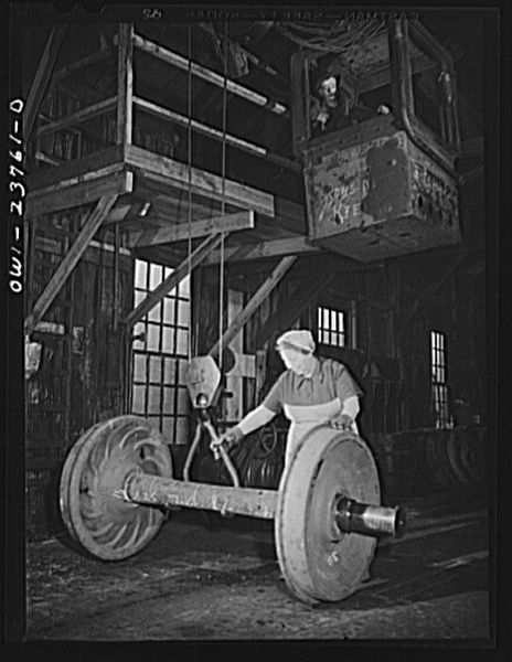 File:Italian-American worker hooking locomotive wheels8d16894v.jpg