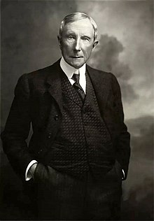 Rockefeller c. 1902. By then, his moustache had fallen off due to alopecia. John D. Rockefeller, Sr.jpg