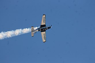 Julie Clark in the T-34 "Free Spirit" at Nellis Air Force Base in 2019. Julie Clark Roll - Aviation Nation 2019.jpg