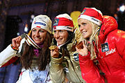 Justyna Kowalczyk (left), Marit Bjørgen (middle) and Therese Johaug (right) during the medal ceremony after the women's individual 15 km race at the Nordic World Ski Championships 2011 in Oslo. (26 February 2011)