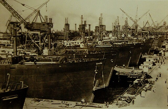 Kaiser-built Liberty ships being outfitted, 1942