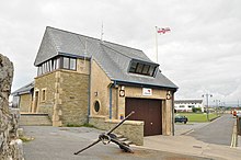 Inshore lifeboat station, which uses a carriage to launch lifeboats. Lifeboat Station - Porthcawl - geograph.org.uk - 1400792.jpg