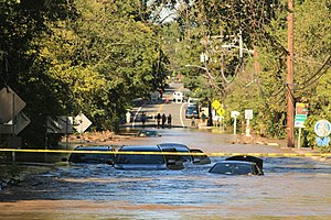 During Tropical Storm Ida, the Millstone River, and much of the Raritan Basin at large, suffered from massive flooding. Pictured here, is the Georgetown Franklin Turnpike bridge connecting Rocky Hill and Franklin Township overflowed by the Millstone River, with abandoned cars submerged in the floodwaters.