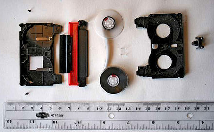 A disassembled MiniDV cassette