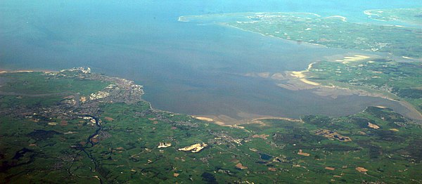 A panorama of most of Morecambe Bay looking from east (bottom of photo) to west (top of photo). Barrow-in-Furness and Walney Island can be seen in the