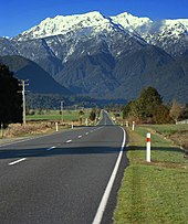 View of the western Southern Alps from a road near Hari Hari, Westland Mountains in New Zealand.jpg