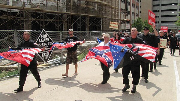 Members of the Detroit-based National Socialist Movement marching at Market Square in Knoxville, Tennessee in 2010