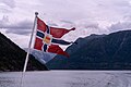 Image 354Norwegian flag hoisted on the Fjorddrott ferry, Osafjorden, Norway