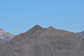 Uitzicht op de zuidkant van Pic Ombière, de hoogste top aan de linkerkant.