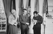 Pelé autographs a soccer ball for President of the United States Richard Nixon (8 May 1973 )