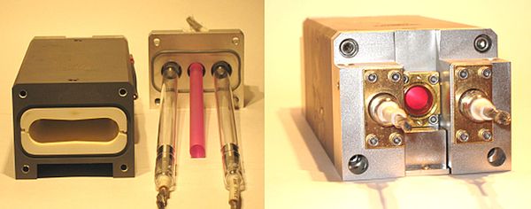 A ruby laser head, assembled and disassembled, revealing pumping cavity, the ruby rod, and two water-cooled flashtubes.