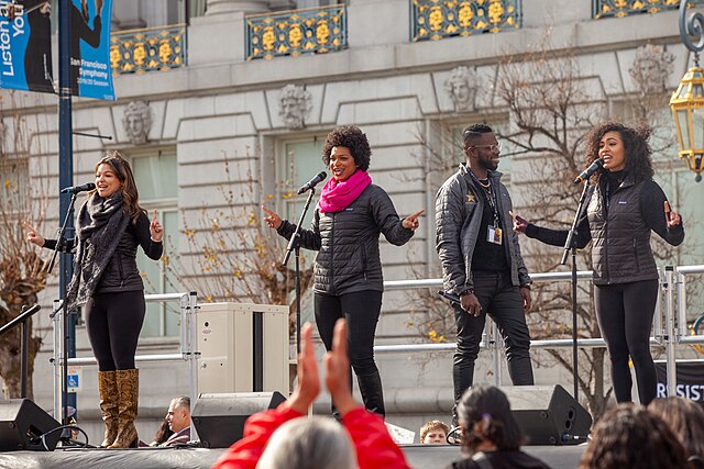 Members of the touring cast perform at the 2020 Women's March in San Francisco.