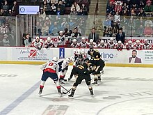 The Sting playing at the Windsor Spitfires in 2023 Sarnia Sting vs. Windsor Spitfires December 2023 18 (face-off).jpg