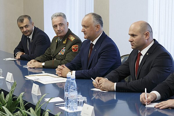 Gaiciuc (center left) with Moldovan President Igor Dodon (center) and Defence Minister Pavel Voicu in August 2019.