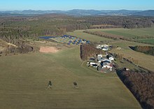 Solarpark bei Oberkalbach mit Blick auf die Rhön im Hintergrund