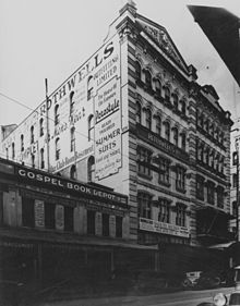 Rothwells Building (centre), Rowes Building (right), 1934 StateLibQld 1 394333 View of stores on Edward Street, Brisbane, 1934.jpg