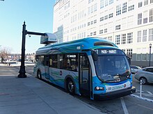 TARC Proterra EcoRide docked in the company's proprietary overhead charger