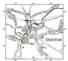 Старая карта с указанием основных дорог и реки в городе. 