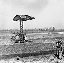 A Churchill bridgelayer of 51st Royal Tank Regiment in action during a demonstration in the Mezzano area, 30 March 1945. The British Army in Italy 1945 NA23553.jpg