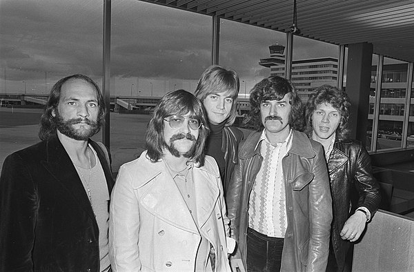 The Moody Blues at Amsterdam Airport Schiphol in 1970; from left to right: Mike Pinder, Graeme Edge, Justin Hayward, Ray Thomas, John Lodge.